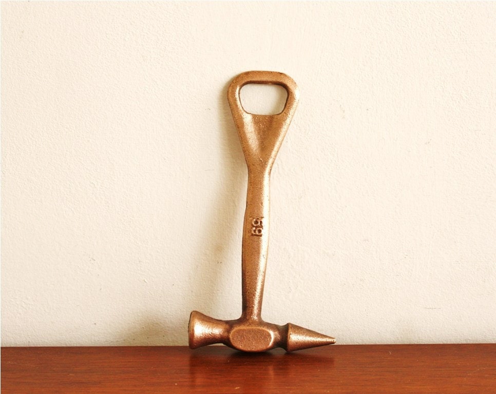 Vintage brass hammer bottle opener