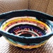 Bohemian Multi-Colored Coiled Fabric Basket with Side Handles - 9 inches across,3.75 inches high