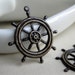 Brass Ship Wheel Charms Hand Antiqued Dark Brown
