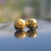 Gold studs earrings. Smarty golden stud earrings. Small hammered round silver earrings
