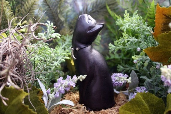 outdoor black cat statue