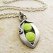 Two peas in a pod necklace