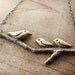 Three little birds necklace in bronze