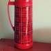 red plaid aladdin thermos