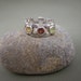 sterling silver ring openwork design with three stones