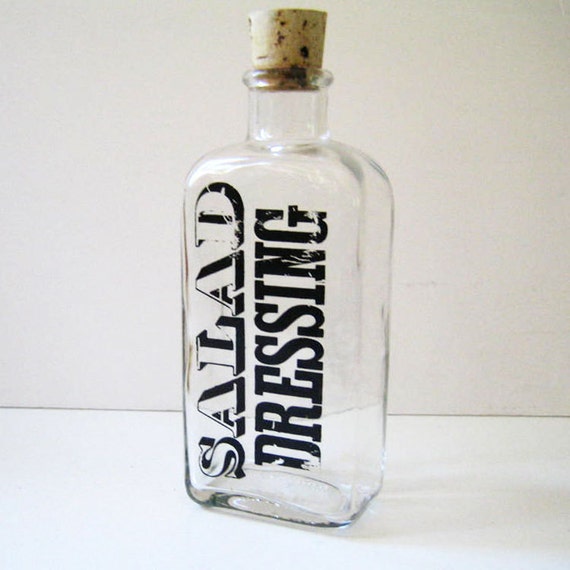 Vintage glass salad dressing bottle 1970s typography.