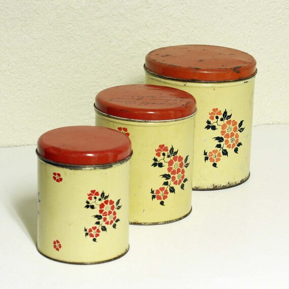 Vintage Canisters set tins Decoware cream color/red