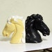RESERVED FOR TRACEY H - Vintage bookends - horse heads - black and cream - chalkware