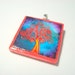Swirling Red and Blue Tree Pendant