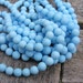 Turquoise Frosted 10mm Round Beads 8 inch strand