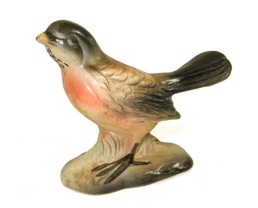 yellow ceramic bird figurine