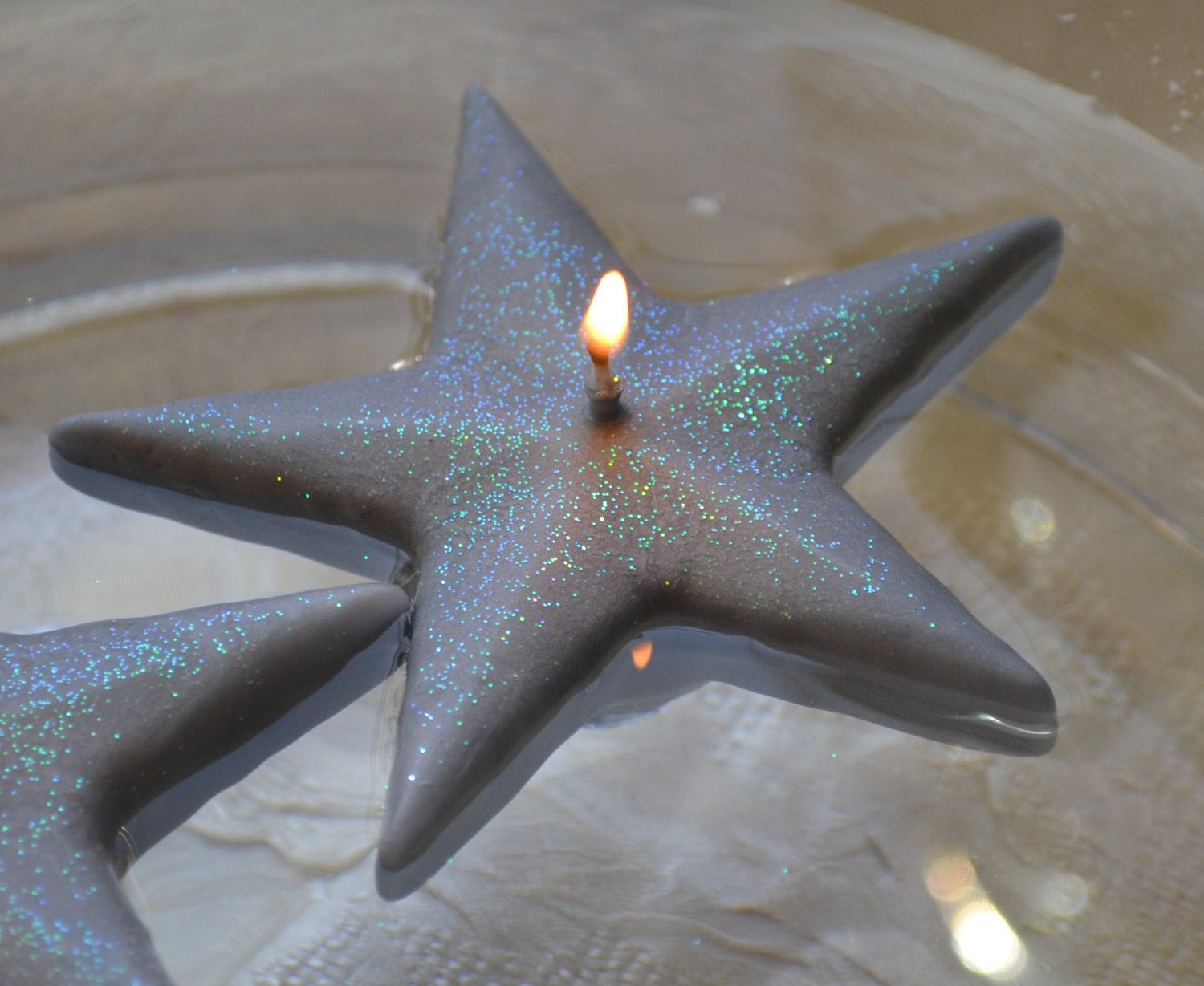 Silver Shimmering Star floating candles set of 12