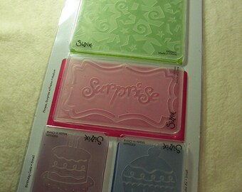 Embossing Folders...4 Piece Set of Brand New Birthday Surprise Embossing Folders