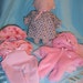 ROSEBUD DOLL and 3 OUTFITS - PRICE REDUCED