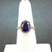 2.72 Carat 10 X 8mm. Natural Blue Sapphire set in a 14k Yellow gold ring with diamonds (.38ct) 1028