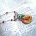 Miss Molly's Designs - Robin Redbreast Vintage Optometrist Lens Necklace