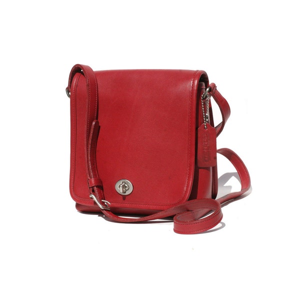 coach bag with red straps