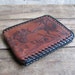 vintage c. 1970s tooled leather wallet with moose family