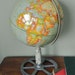 Vintage globe on industrial stand
