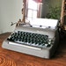 RESV Smith Corona portable typewriter with floating shift - green keys - 1950 - with manual and case