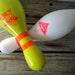 Pair of Neon Bowling Pins. His & Her Bookends
