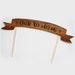 As seen in MARTHA STEWART WEDDINGS wood cake flag banner