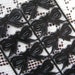 Dresden Trim Made In Germany 10 Little Black Embossed Bows