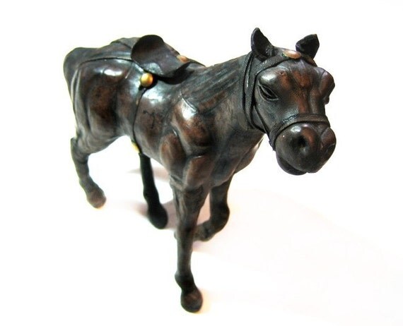 leather covered horse figurine