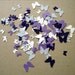 Butterflies in different shades of purple and white punch-outs