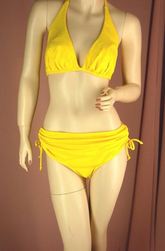 fluorescent yellow swimsuit