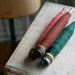 vintage wood spools with yarn