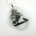 Recycled Glass Jewelry Clear Flattened Wine Bottle Necklace with a Tree and Crow