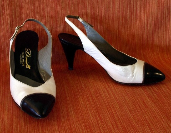 spectator pumps black white