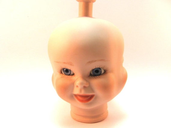 vintage doll with 3 faces