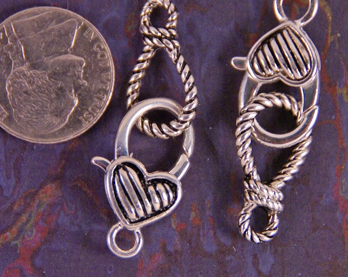 Two Silver-tone Lasso and Heart Toggle Clasps