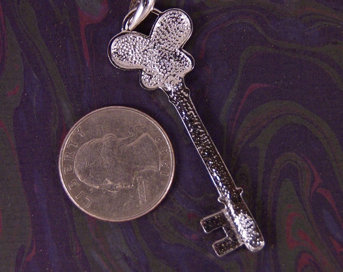 Rhinestone Skeleton Key with Butterfly Motif Top Pendant