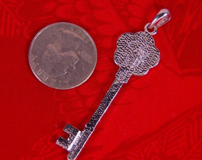 Rhinestone Encrusted Skeleton Key with Flower-shape Top Pendant