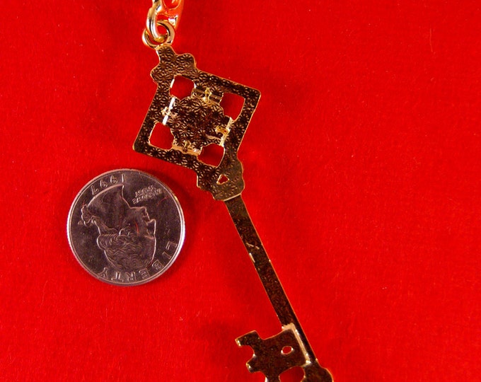 Rhinestone Skeleton Key with Diamond Shape Top Pendant Gold-tone