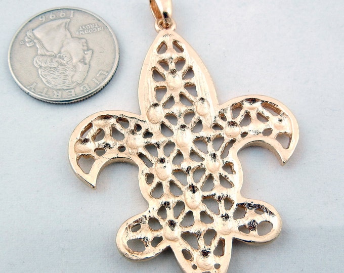 Gold-tone Lattice Fleur de Lis Pendant with Rhinestone Accents Heraldry