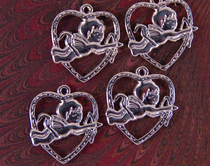 4 Silver-tone Cupid in Heart Cut-out Charms