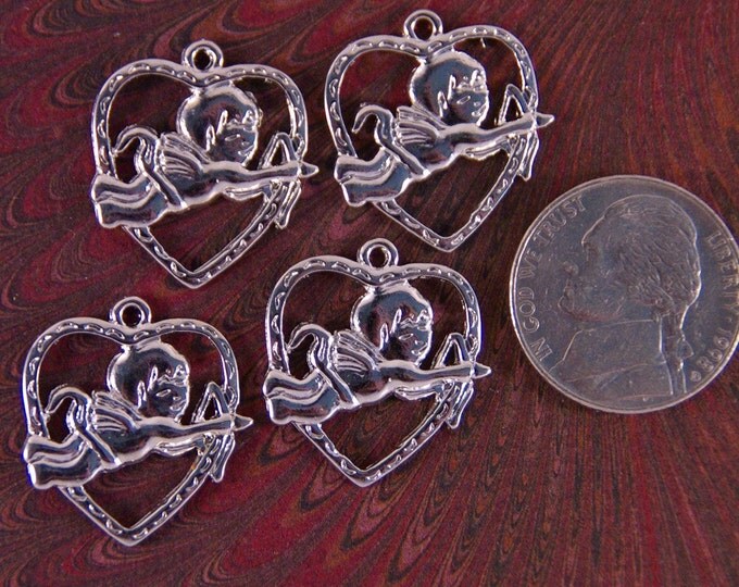 4 Silver-tone Cupid in Heart Cut-out Charms