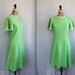 vintage 1960s mod dress, size 6 - 8. Textured green with white lace trim, short sleeved / the KEY LIME PIE frock