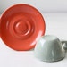 vintage 1950s melamine cup and saucer. Russel Wright Melmac Residential. Confetti salmon, gray / the COFFEE ADDICT set