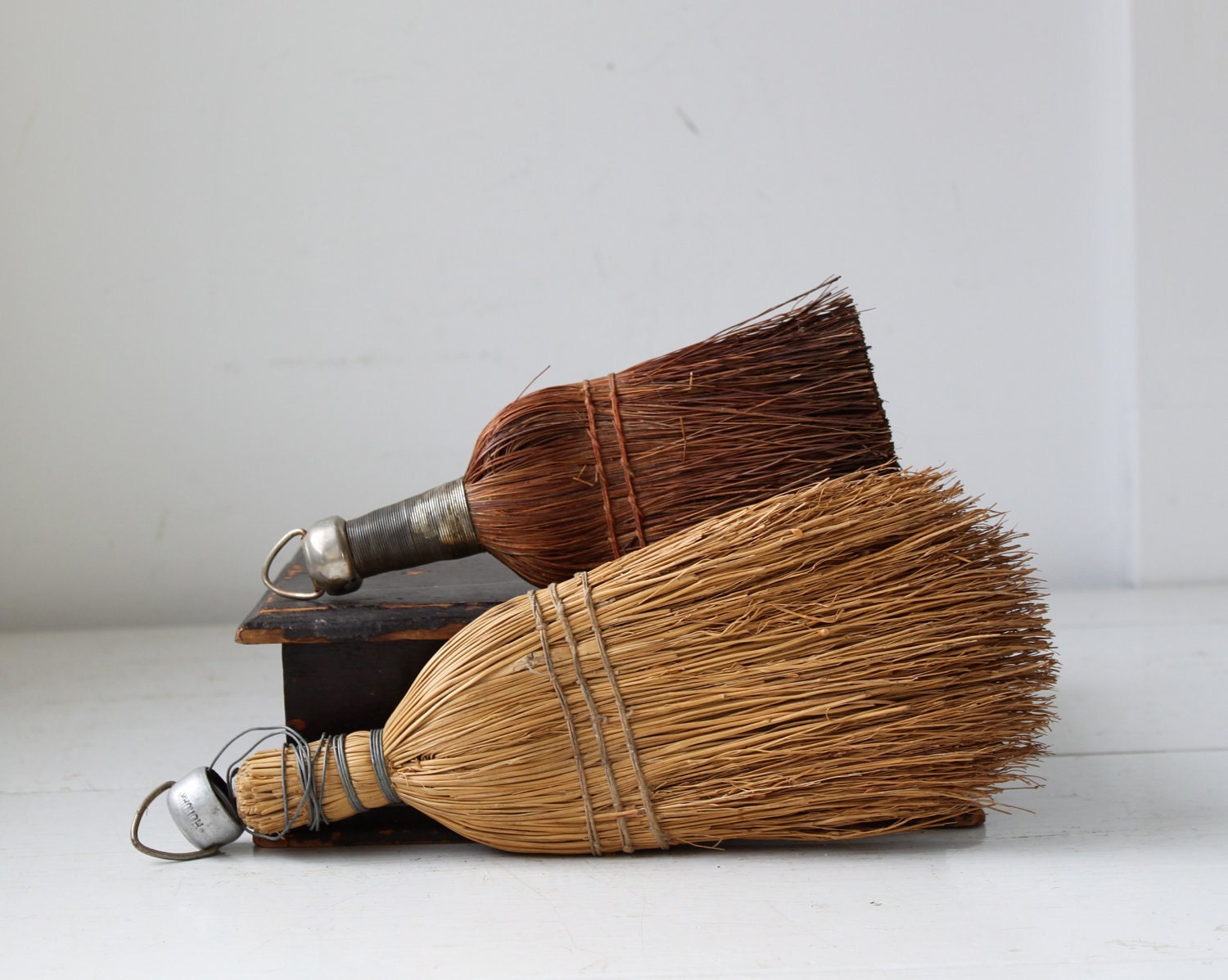 vintage 1930s whisk brooms set of 2. rustic industrial