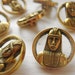 Seven 3/4" Gold Metal Pharaoh Head Vintage Egyptian Buttons