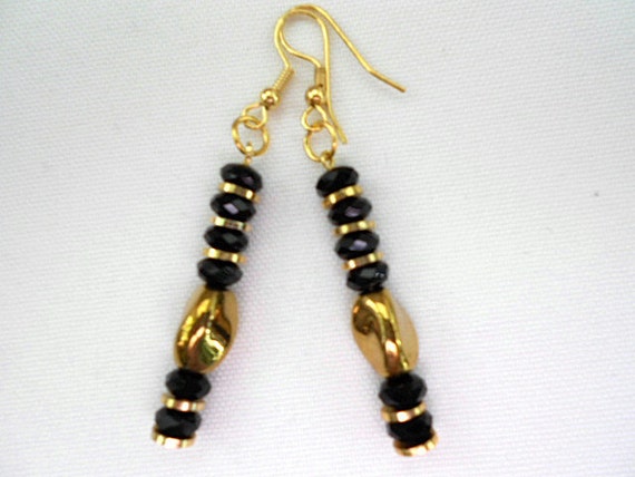 Black Earrings Gold Twist Ovals Black Crystals. Gold