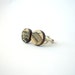 Cufflinks made with antique French newspaper