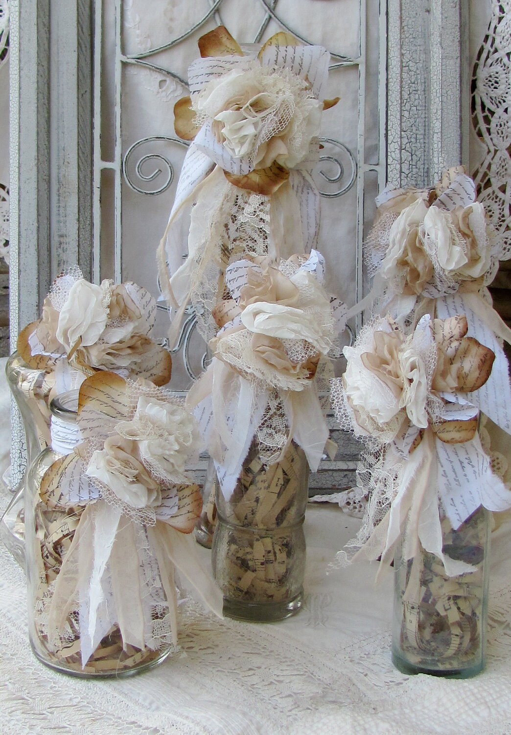 wedding shabby chic bottles with flower and vintage sheets of wedding shabby chic bottles with flower and vintage sheets of