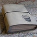 bucket list journal with maps featured in Better Homes and Gardens 2011 Gift Guide