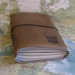 bucket list journal with maps featured in Better Homes and Gardens Gift Guide